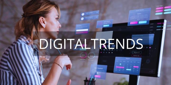 Digitaltrends - eine Fraub sitzt am Computer, um sie herum schweben Diagramme